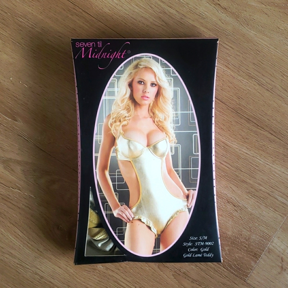Gold Teddy With Ruffle Trim And Removable Padding.
